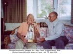 Gordon Barnes presents George Braceland with trophy as Oldest Photo Mapper